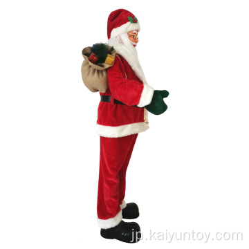 ギフトバッグの装飾が施されたクリスマスに立っているサンタクロース